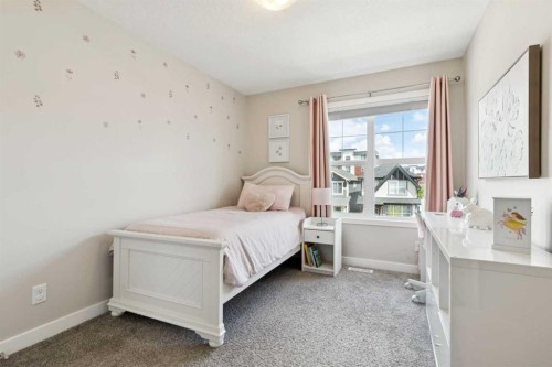303 Masters Row Se, Calgary, AB - Indoor Photo Showing Bedroom