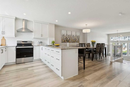 303 Masters Row Se, Calgary, AB - Indoor Photo Showing Kitchen With Upgraded Kitchen