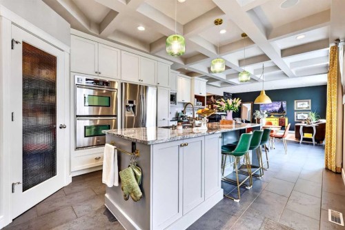 31 Kingston View Se, Airdrie, AB - Indoor Photo Showing Kitchen With Upgraded Kitchen