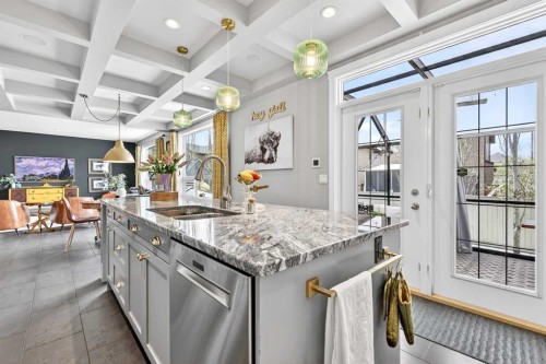 31 Kingston View Se, Airdrie, AB - Indoor Photo Showing Kitchen With Upgraded Kitchen