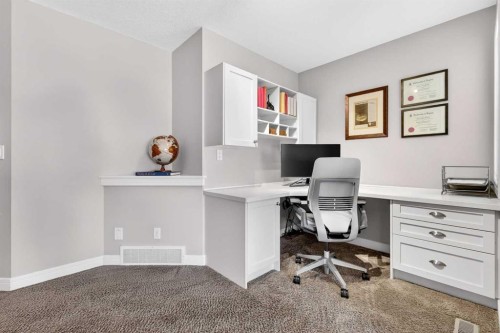 31 Kingston View Se, Airdrie, AB - Indoor Photo Showing Office
