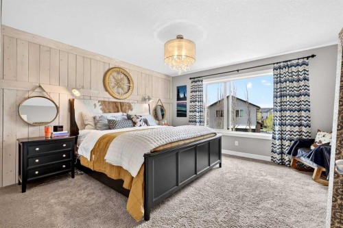 31 Kingston View Se, Airdrie, AB - Indoor Photo Showing Bedroom