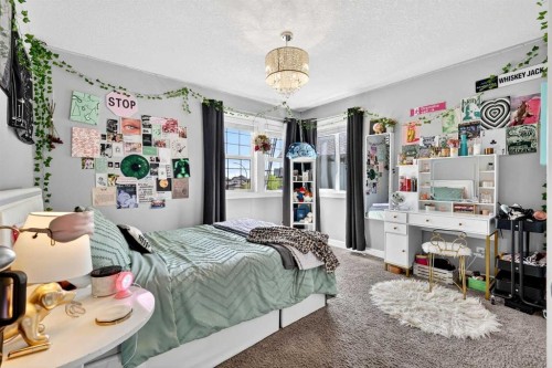 31 Kingston View Se, Airdrie, AB - Indoor Photo Showing Bedroom