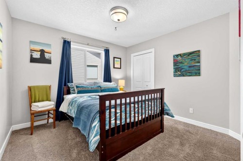 31 Kingston View Se, Airdrie, AB - Indoor Photo Showing Bedroom