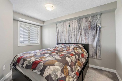 305-355 Taralake Way Ne, Calgary, AB - Indoor Photo Showing Bedroom