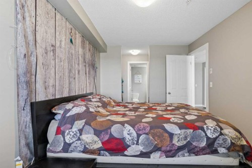 305-355 Taralake Way Ne, Calgary, AB - Indoor Photo Showing Bedroom