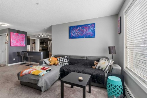 305-355 Taralake Way Ne, Calgary, AB - Indoor Photo Showing Living Room