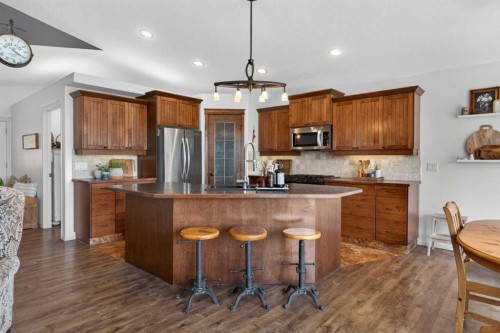 283 Willow Ridge Manor, Diamond Valley, AB - Indoor Photo Showing Kitchen With Upgraded Kitchen