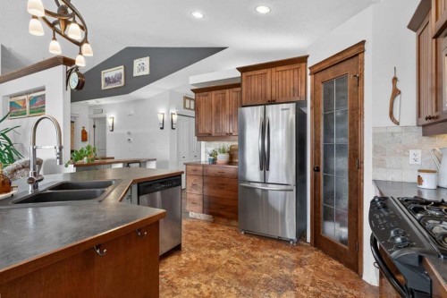 283 Willow Ridge Manor, Diamond Valley, AB - Indoor Photo Showing Kitchen With Double Sink