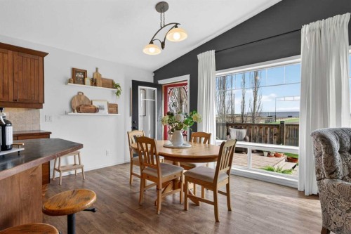 283 Willow Ridge Manor, Diamond Valley, AB - Indoor Photo Showing Dining Room