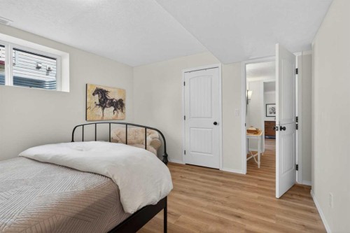 283 Willow Ridge Manor, Diamond Valley, AB - Indoor Photo Showing Bedroom