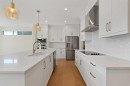 185 South Shore View, Chestermere, AB  - Indoor Photo Showing Kitchen With Upgraded Kitchen 