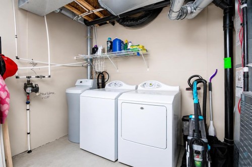 168 Prestwick Heights Se, Calgary, AB - Indoor Photo Showing Laundry Room
