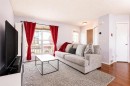 168 Prestwick Heights Se, Calgary, AB  - Indoor Photo Showing Living Room 