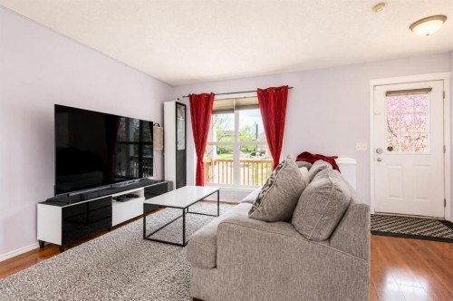 168 Prestwick Heights Se, Calgary, AB - Indoor Photo Showing Living Room