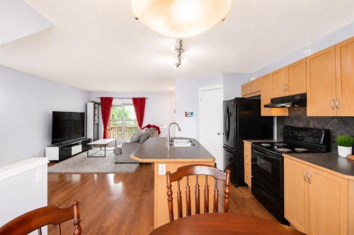 168 Prestwick Heights Se, Calgary, AB - Indoor Photo Showing Kitchen With Double Sink