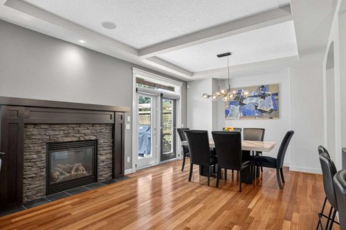 30 Cranarch Circle Se, Calgary, AB - Indoor Photo Showing Other Room With Fireplace
