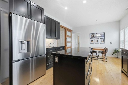 130 Garrison Square Sw, Calgary, AB - Indoor Photo Showing Kitchen With Stainless Steel Kitchen