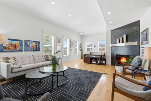 130 Garrison Square Sw, Calgary, AB - Indoor Photo Showing Living Room With Fireplace