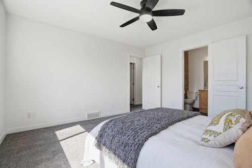 86 Brightondale Parade Se, Calgary, AB - Indoor Photo Showing Bedroom