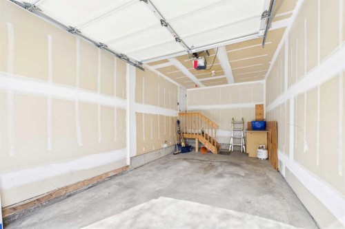 144 Simcoe Place Sw, Calgary, AB - Indoor Photo Showing Garage