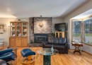 4808 Valiant Drive Nw, Calgary, AB  - Indoor Photo Showing Living Room With Fireplace 