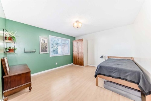 1319 104 Avenue Sw, Calgary, AB - Indoor Photo Showing Bedroom