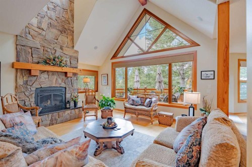 14 Blue Grouse Ridge, Canmore, AB - Indoor Photo Showing Living Room With Fireplace