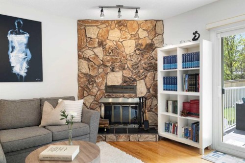 14207 Deer Run Boulevard Se, Calgary, AB - Indoor Photo Showing Living Room With Fireplace