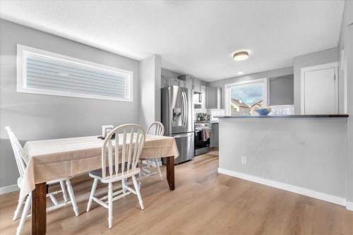 38 Tuscany Valley Heights Nw, Calgary, AB - Indoor Photo Showing Dining Room
