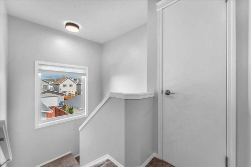 38 Tuscany Valley Heights Nw, Calgary, AB - Indoor Photo Showing Other Room