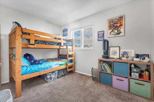 38 Tuscany Valley Heights Nw, Calgary, AB - Indoor Photo Showing Bedroom
