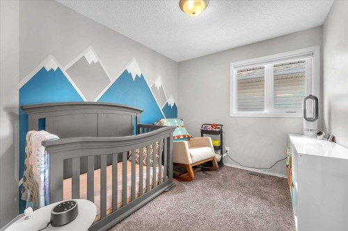 38 Tuscany Valley Heights Nw, Calgary, AB - Indoor Photo Showing Bedroom