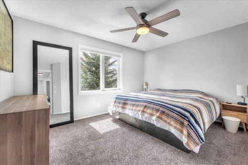 38 Tuscany Valley Heights Nw, Calgary, AB - Indoor Photo Showing Bedroom