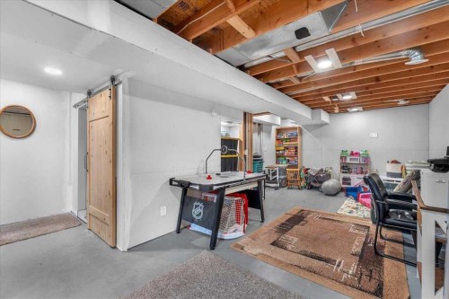 38 Tuscany Valley Heights Nw, Calgary, AB - Indoor Photo Showing Basement