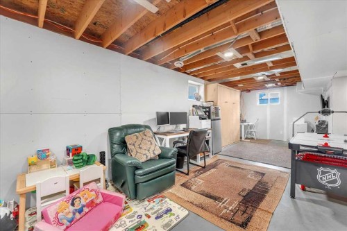 38 Tuscany Valley Heights Nw, Calgary, AB - Indoor Photo Showing Basement