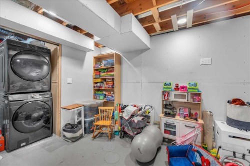 38 Tuscany Valley Heights Nw, Calgary, AB - Indoor Photo Showing Laundry Room