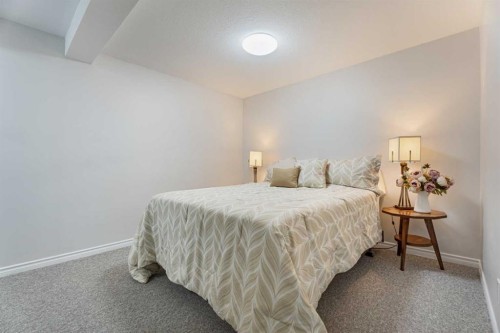 49 Lock Crescent, Okotoks, AB - Indoor Photo Showing Bedroom