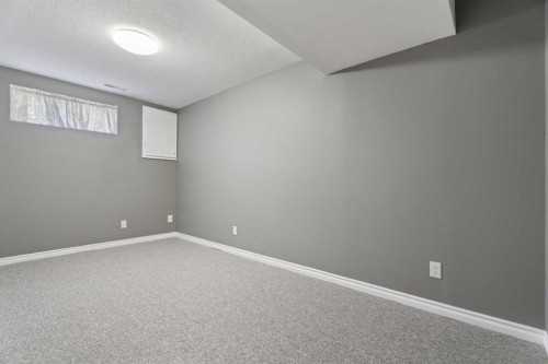 49 Lock Crescent, Okotoks, AB - Indoor Photo Showing Other Room
