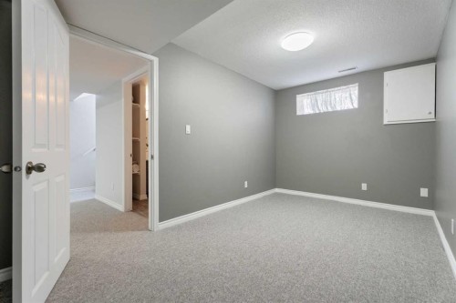49 Lock Crescent, Okotoks, AB - Indoor Photo Showing Other Room