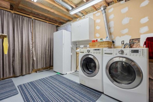 49 Lock Crescent, Okotoks, AB - Indoor Photo Showing Laundry Room