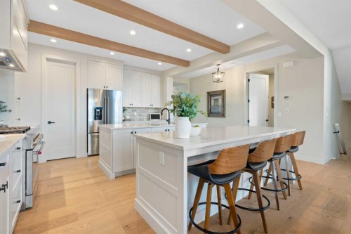26 Bluerock Avenue Sw, Calgary, AB - Indoor Photo Showing Kitchen With Upgraded Kitchen