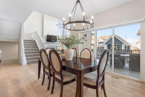 26 Bluerock Avenue Sw, Calgary, AB - Indoor Photo Showing Dining Room