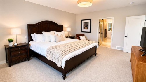 26 Bluerock Avenue Sw, Calgary, AB - Indoor Photo Showing Bedroom