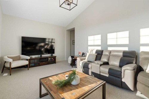 26 Bluerock Avenue Sw, Calgary, AB - Indoor Photo Showing Living Room