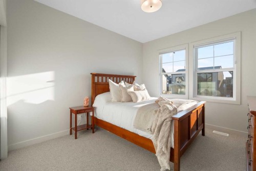 26 Bluerock Avenue Sw, Calgary, AB - Indoor Photo Showing Bedroom