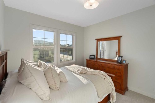 26 Bluerock Avenue Sw, Calgary, AB - Indoor Photo Showing Bedroom