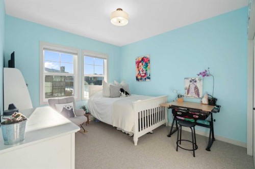 26 Bluerock Avenue Sw, Calgary, AB - Indoor Photo Showing Bedroom