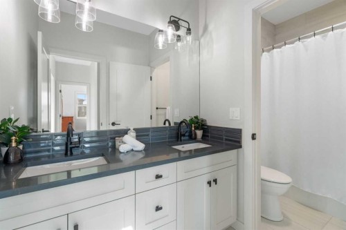 26 Bluerock Avenue Sw, Calgary, AB - Indoor Photo Showing Bathroom