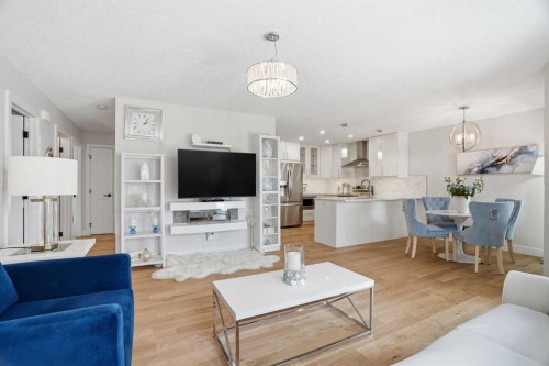 44 Vandoos Gardens Nw, Calgary, AB - Indoor Photo Showing Living Room